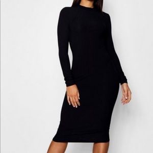 Ribbed high neck long sleeved midi dress.